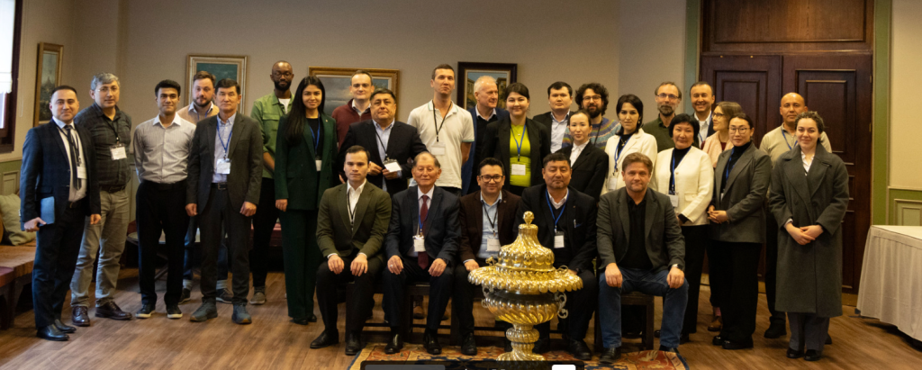 project participants posing for a photo in a room